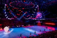 an ice rink with people on it